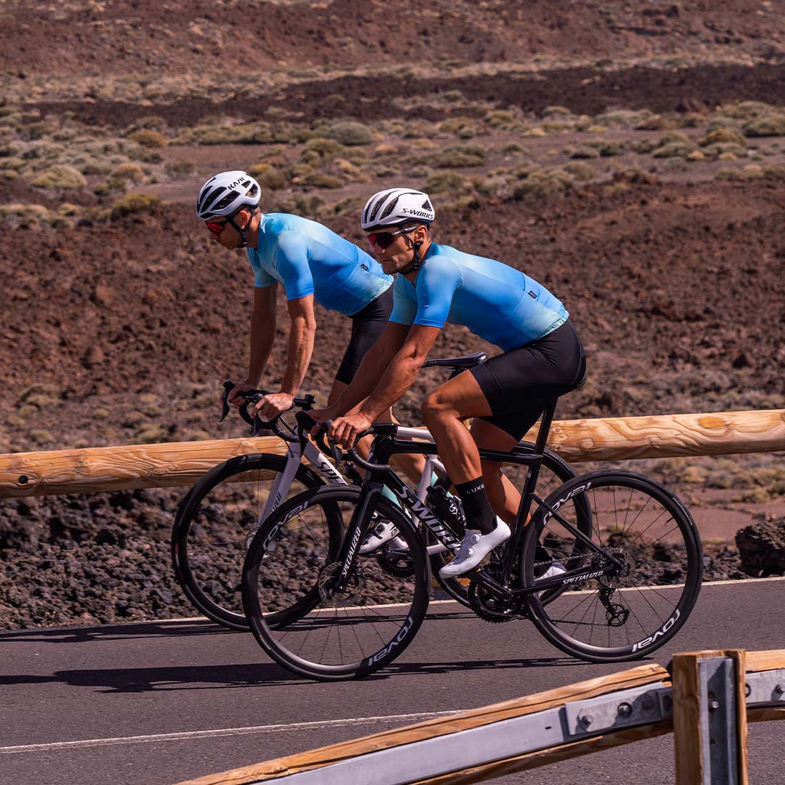 cyclists are riding on Teide and wearing blue Luxa Prism jerseys